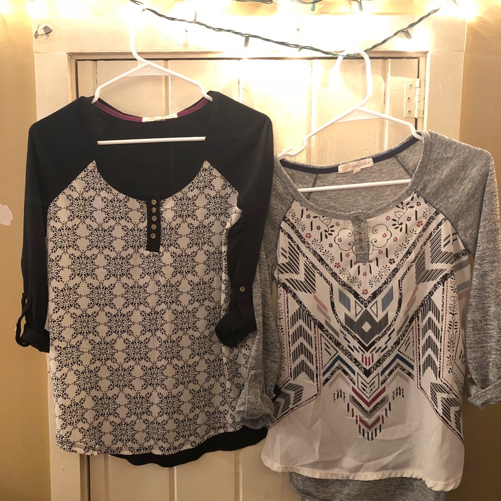two 3/4 sleeve shirts